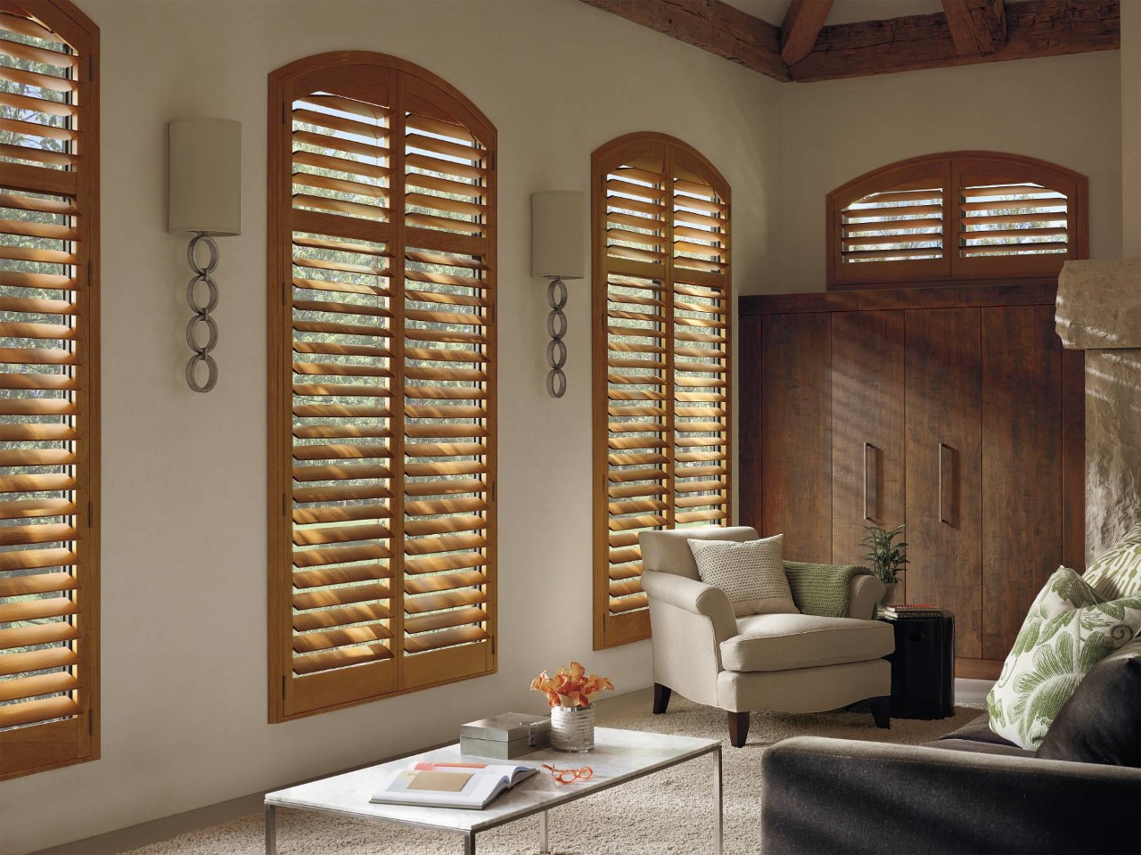Hunter Douglas arched shutters covering a window near Sioux Falls, SD